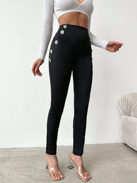 Pantalones ajustados de talle alto con diseno de boton