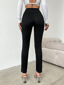 Pantalones ajustados de talle alto con diseno de boton