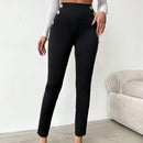 Pantalones ajustados de talle alto con diseno de boton