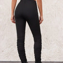 Pantalones ajustados con dobladillo con abertura alta y plisados de color liso para mujer