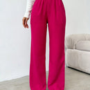 Pantalones sueltos de pierna ancha de color solido para mujer con dobladillo fluido, estilo casual