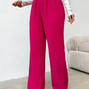 Pantalones sueltos de pierna ancha de color solido para mujer con dobladillo fluido, estilo casual