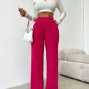 Pantalones sueltos de pierna ancha de color solido para mujer con dobladillo fluido, estilo casual