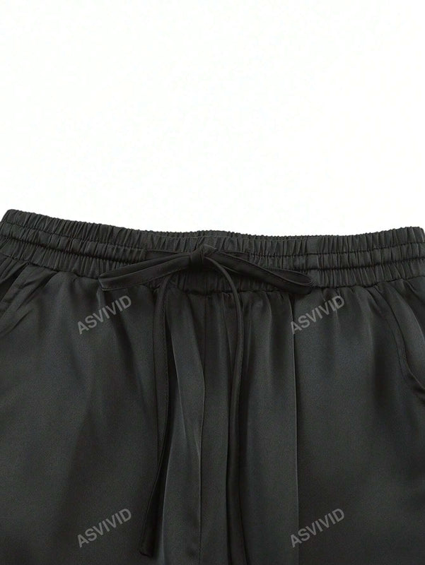 Pantalones cargo de mujer con bolsillo con solapa, cordon y cintura elastica