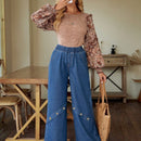 LUNE Jeans Con Detalles De Botones Y Piernas Anchas