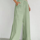 Pantalones sueltos de pierna ancha de color solido para mujer con dobladillo fluido, estilo casual