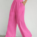 Pantalones sueltos de pierna ancha de color solido para mujer con dobladillo fluido, estilo casual