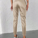 Pantalones conicos casuales con diseno de botones de color liso