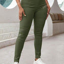 Pantalones ajustados de tobillo comodos, con bolsillos inclinados de cintura alta y tela elastica solida para el uso diario casual