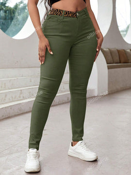 Pantalones ajustados de tobillo comodos, con bolsillos inclinados de cintura alta y tela elastica solida para el uso diario casual
