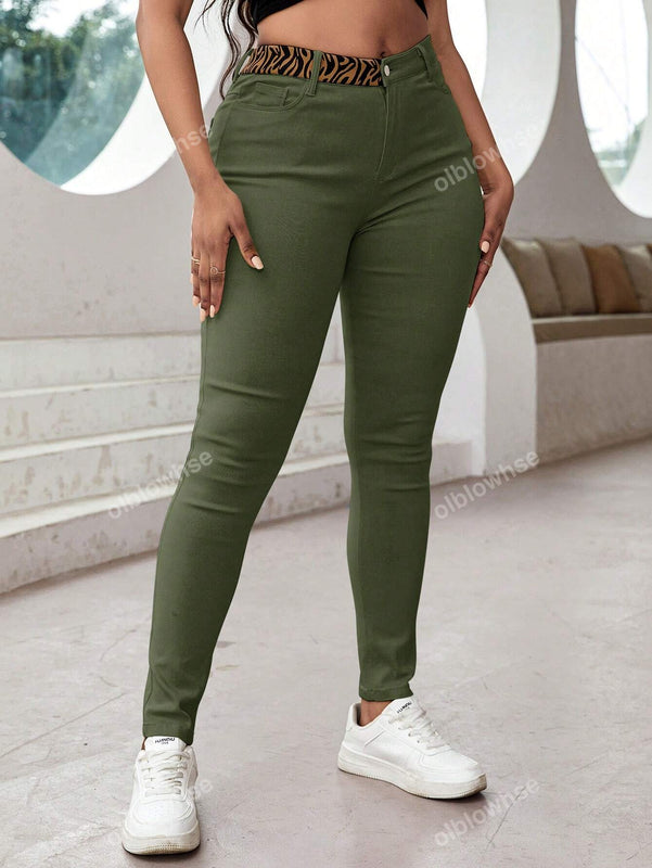 Pantalones ajustados de tobillo comodos, con bolsillos inclinados de cintura alta y tela elastica solida para el uso diario casual