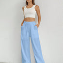 Pantalones sueltos de pierna ancha de color solido para mujer con dobladillo fluido, estilo casual