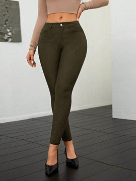 Pantalones ajustados de talle alto y cremallera para mujer de color liso