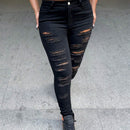 Pantalones ajustados rasgados con piernas estrechas