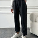Pantalones largos casuales de cintura elastica con cordon y color solido