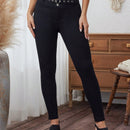 LUNE Pantalones pitillo con diseno de ojales metalicos de doble hilera de color liso para mujer