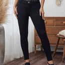 LUNE Pantalones pitillo con diseno de ojales metalicos de doble hilera de color liso para mujer