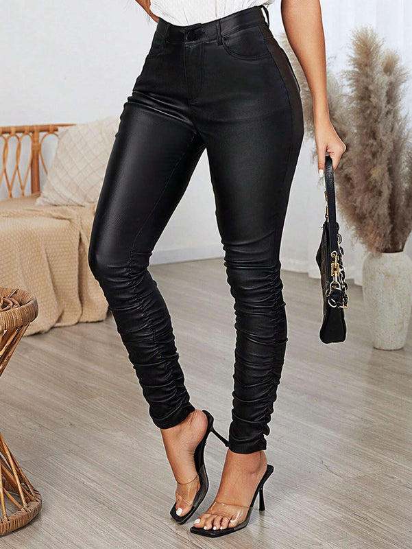 Essnce Pantalones ajustados de mujer con pliegues