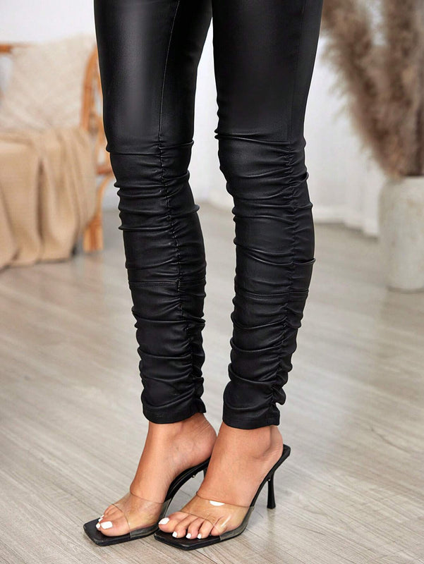 Essnce Pantalones ajustados de mujer con pliegues
