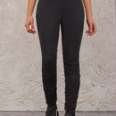 Pantalones ajustados con dobladillo con abertura alta y plisados de color liso para mujer