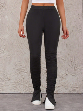Pantalones ajustados con dobladillo con abertura alta y plisados de color liso para mujer