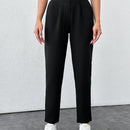 Pantalones de mujer con pliegues de cintura alta de color solido