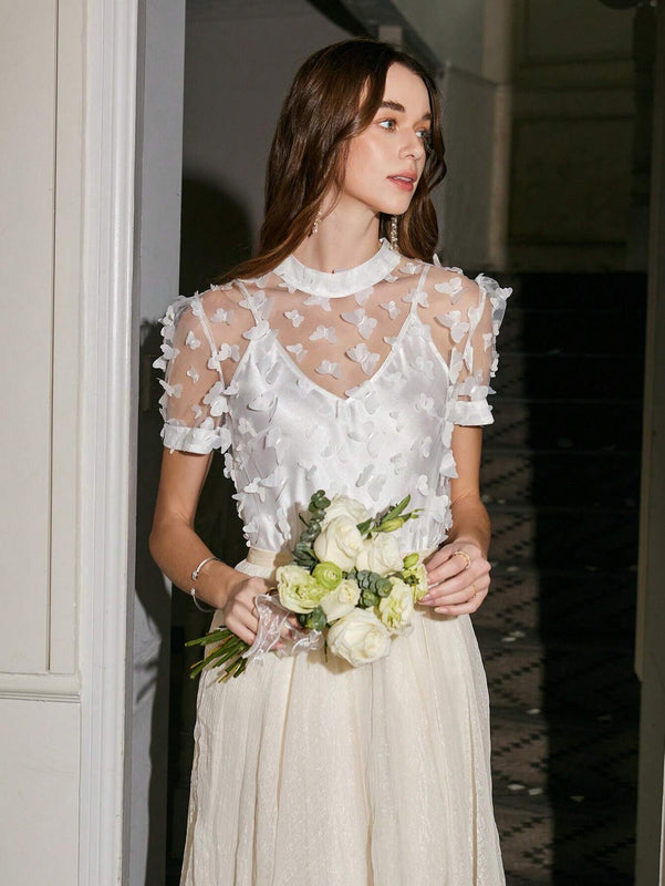 Top Transparente Con Apliques De Mariposa En 3d