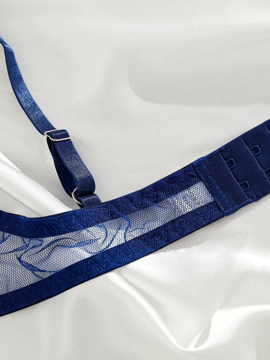 Conjunto de lenceria sexy azul bordado transparente con copa completa