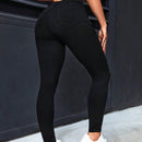 PETITE Pantalones ajustados de unicolor para damas con efecto desgastado