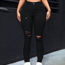 PETITE Pantalones ajustados de unicolor para damas con efecto desgastado
