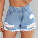 Short De Mezclilla Con Bordes Crudos Y Deshilachados