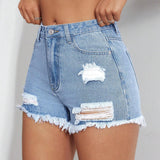 Short De Mezclilla Con Bordes Crudos Y Deshilachados
