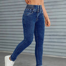Jeans ajustados con boton