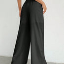 Pantalones sueltos de pierna ancha de color solido para mujer con dobladillo fluido, estilo casual