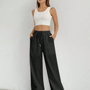 Pantalones sueltos de pierna ancha de color solido para mujer con dobladillo fluido, estilo casual