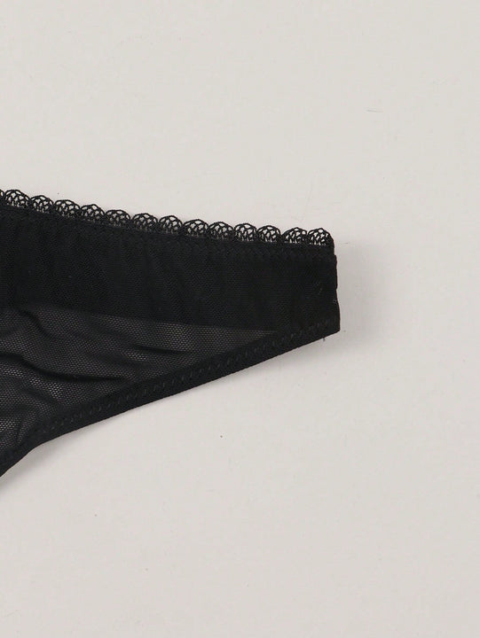 Mujeres tanga sexy y comodo semitransparente con impresion de corazon y eslogan, adecuado para citas diarias.