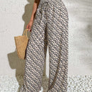 Pantalones anchos boho casuales elegantes con tejido de punto estampado, textura ahumada en la cintura con cordon decorado