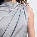 Maija Camisa larga sin mangas para mujer de color gris plateado solido con dobladillo asimetrico
