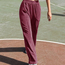 Pantalones con detalles de costura y cintura elastica