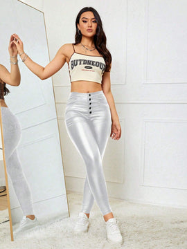 Essnce Pantalones ajustados de moda para mujer con detalles en metal y cierre frontal con boton