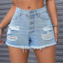 Elegantes shorts rasgados y deshilachados de mezclilla para el verano