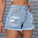 Elegantes shorts rasgados y deshilachados de mezclilla para el verano