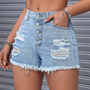 Elegantes shorts rasgados y deshilachados de mezclilla para el verano