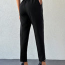 Pantalones rectos con bolsillos sesgados y arrugas para mujer