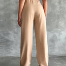 Pantalones altos de pierna ancha con pliegues
