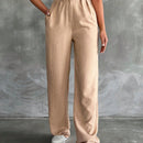 Pantalones altos de pierna ancha con pliegues