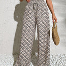 Pantalones anchos boho casuales elegantes con tejido de punto estampado, textura ahumada en la cintura con cordon decorado