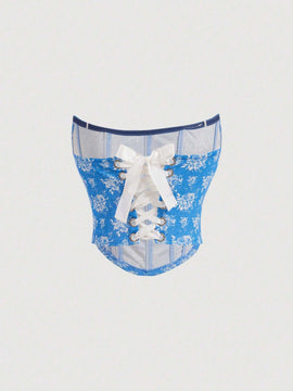 MOD Top corto con corte triangular en forma de banda tejida con patron floral impreso en blanco y azul que moldea la cintura