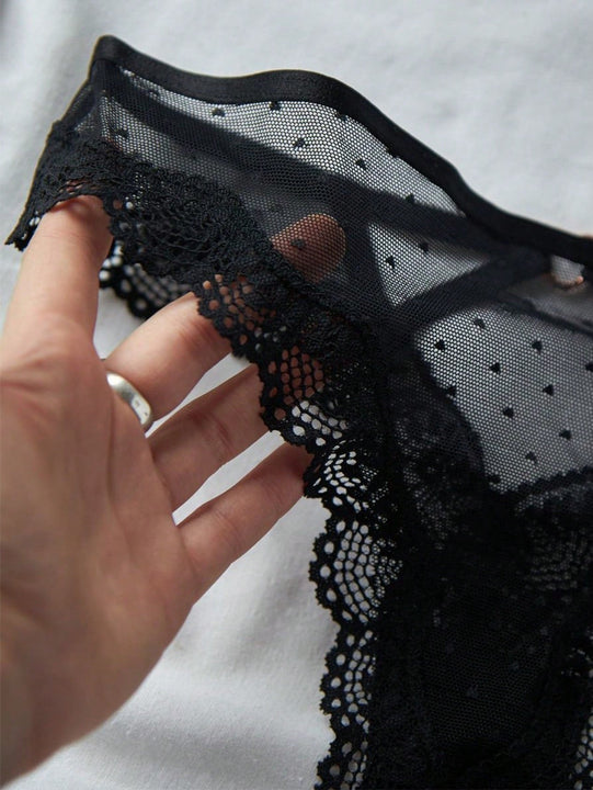 Conjunto de panty de tanga floral adornado de encaje sexy para mujer con ligas en muslos