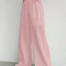 Pantalones sueltos de pierna ancha de color solido para mujer con dobladillo fluido, estilo casual